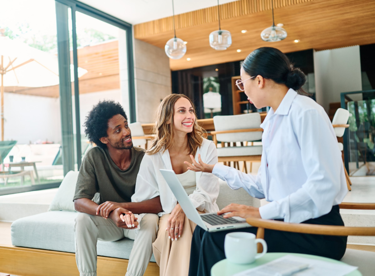 A couple discussing their goals during a consultation at home